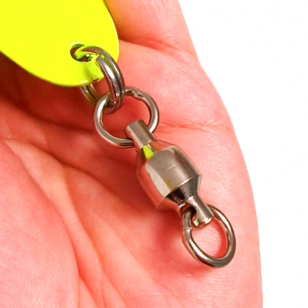 9 in Metal Jig with Feather Treble Hook, 145 g (5.1 oz) – product photo