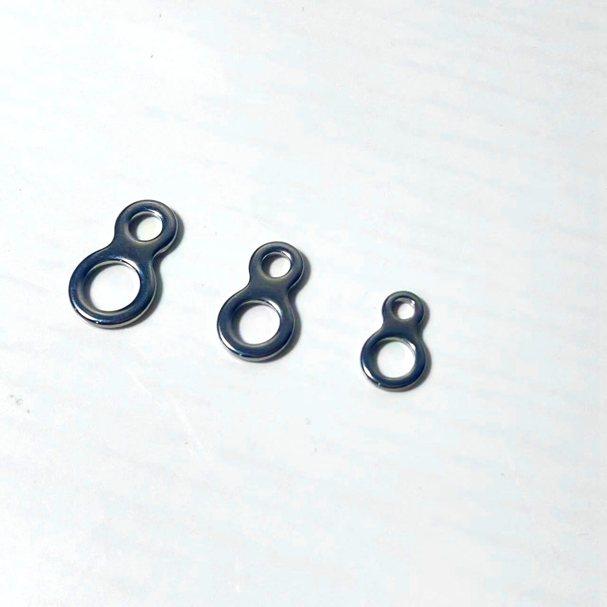 Seamless Figure-Eight Ring Connector, Pear-Shaped Double Hole – product photo
