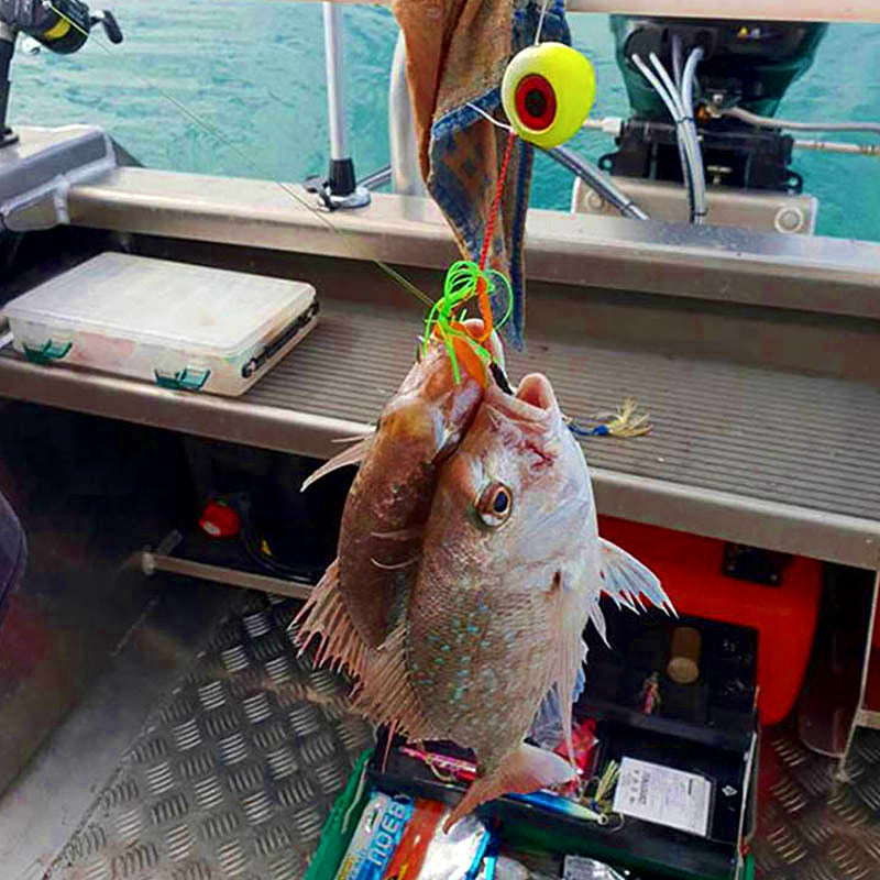 Glow Slow Pitch Jig with Assist Hook, 60–300 g (2.1–10.6 oz) – product photo